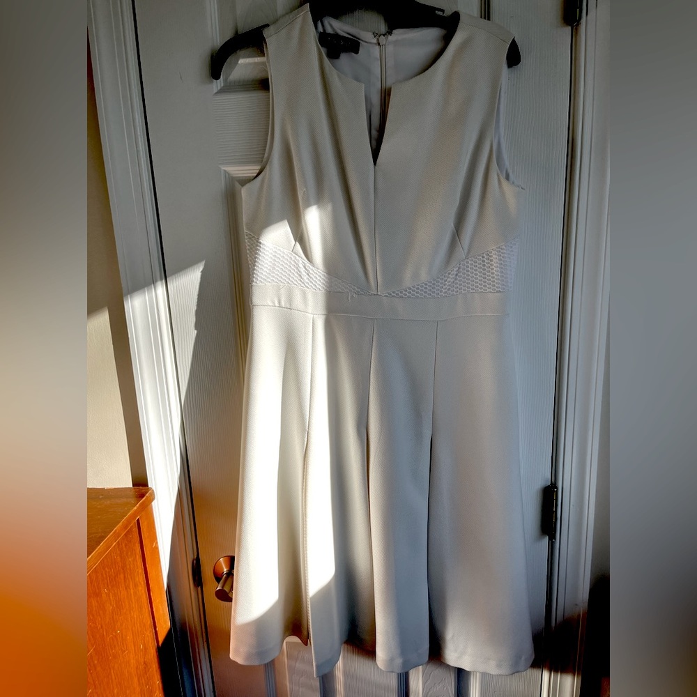 Nine West white knee length fit and flare dress with mesh inserts